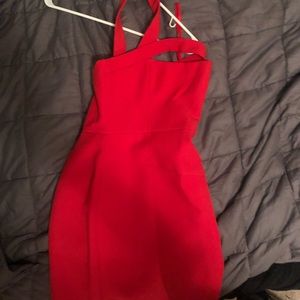 Red dress with a side strap.